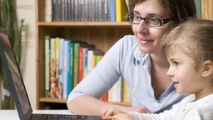 parent teaching his kid